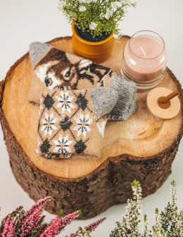 Black and gray socks with pink flowers made of rabbit wool