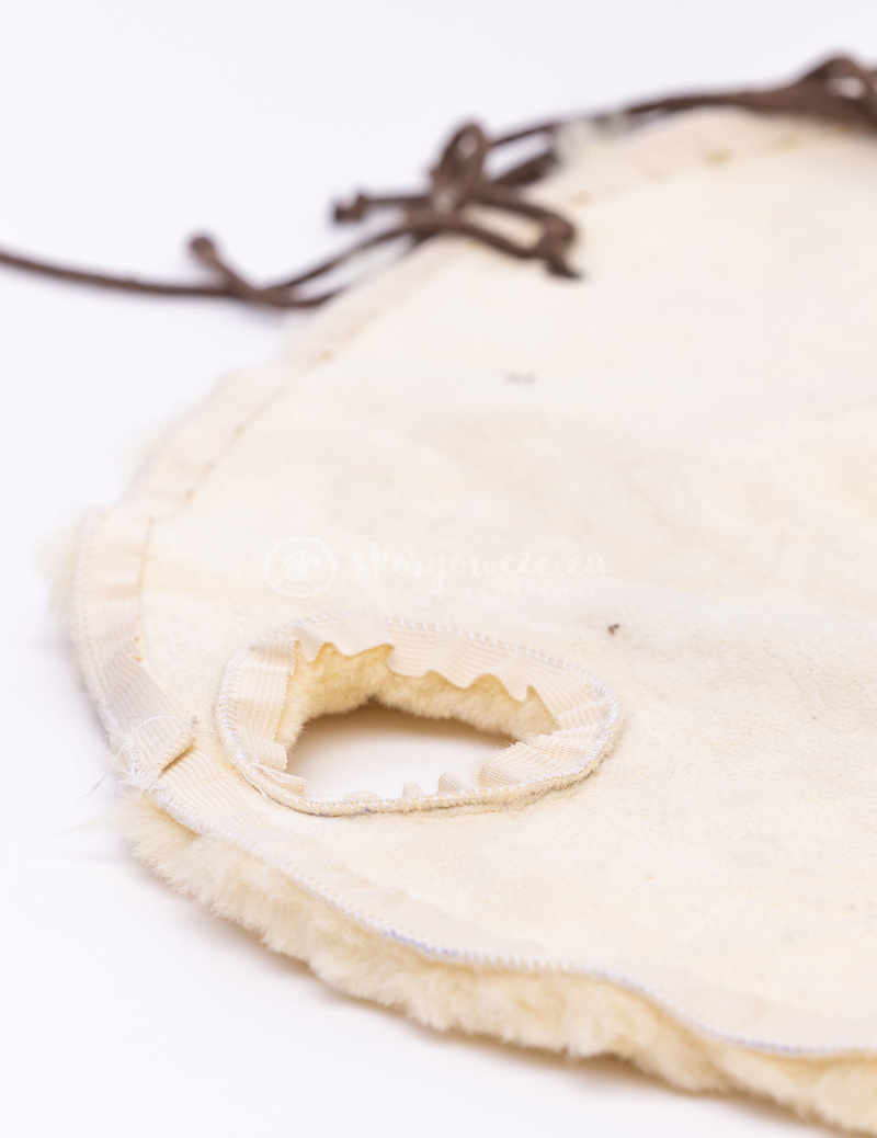 A western style horse saddle cover made of natural sheep leather A western style horse saddle cover made of natural sheep leather